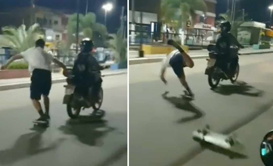 Jovem anda de skate segurando traseira de moto e leva tombo no centro de Cruzeiro do Sul; assista