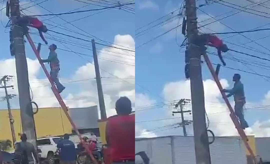 Homem fica pendurado em poste após tocar em fio de alta tensão durante serviço