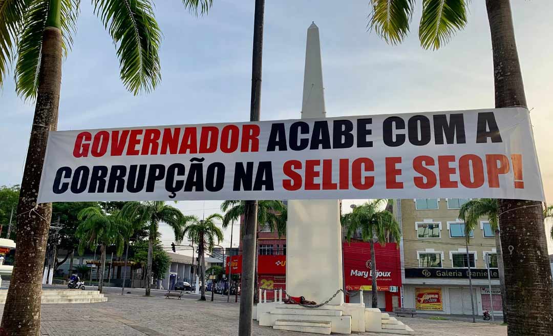 Faixas são colocadas no Centro de Rio Branco pedindo o fim da corrupção na Selic e Seop e depois são retiradas