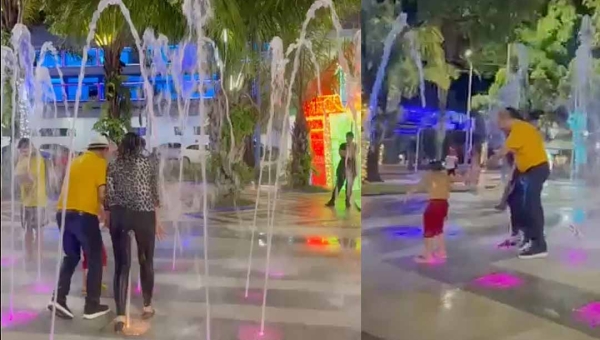 Bocalom e sua esposa Kellen tomam banho na fonte da Praça da Revolução na última noite das luzes de Natal da prefeitura